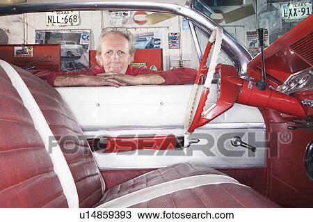 Stock Image - Interior of Restored 1961 Chevrolet Impala. Fotosearch