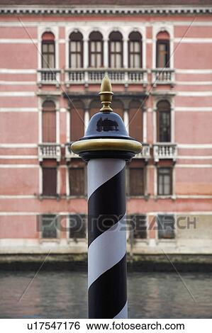 Italy, Venice, focus on pole by canal View Large Photo Image Stock Photograph - Italy, Venice, focus on pole by canal. Fotosearch