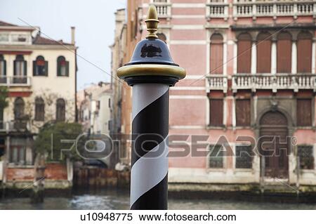 Italy, Venice, focus on pole by canal View Large Photo Image Stock Photography - Italy, Venice, focus on pole by canal. Fotosearch