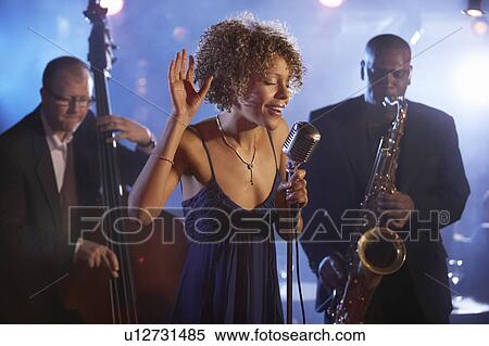 Jazz band on stage, group portrait View Large Photo Image Stock Photography - Jazz band on stage, group portrait. Fotosearch