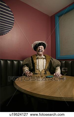 King Henry VIII counting money at table, laughing View Large Photo Image Stock Photo - King Henry VIII counting money at table, laughing. Fotosearch