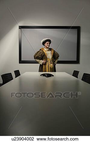 King Henry VIII standing at table in conference room View Large Photo Image Stock Image - King Henry VIII standing at table in conference room. Fotosearch