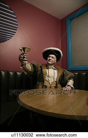 King Henry VIII toasting with goblet in bar View Large Photo Image Stock Image - King Henry VIII toasting with goblet in bar. Fotosearch