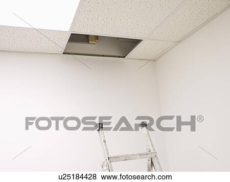 Ladder in Below Open Ceiling Panel in Empty Office View Large Photo Image Stock Photo - Ladder in Below Open Ceiling Panel in Empty Office. Fotosearch
