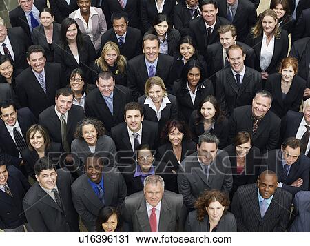 Large group of business people looking up, portrait, elevated view View Large Photo Image Stock Image - Large group of business people looking up, portrait, elevated view. Fotosearch