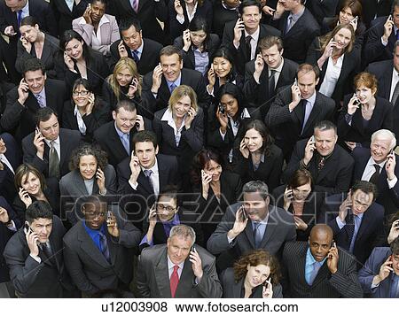 Large group of business people using mobile phones, portrait, elevated view View Large Photo Image Stock Photo - Large group of business people using mobile phones, portrait, elevated view. Fotosearch
