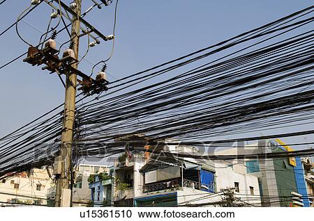 Stock Image - Large Group of Power Lines in City. Fotosearch