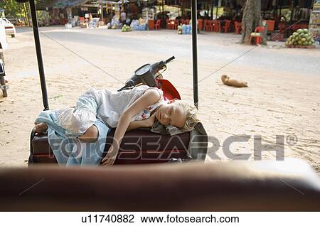 Little Girl Sleeping on Seat of Rickshaw View Large Photo Image Stock Image - Little Girl Sleeping on Seat of Rickshaw. Fotosearch