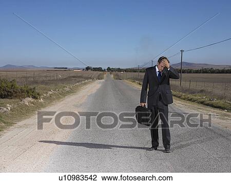 Stock Image - Man in Despair. Fotosearch