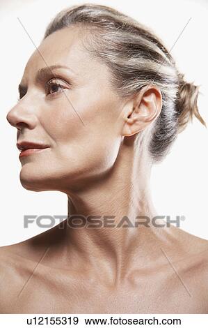 Stock Photo - Middle-Aged Woman, shiny skin. Fotosearch