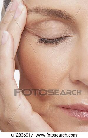 Middle-Aged Woman with headache View Large Photo Image Stock Photo - Middle-Aged Woman with headache. Fotosearch
