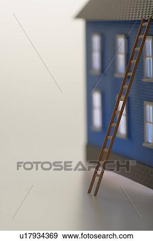 Stock Photo - Model house with ladder. Fotosearch