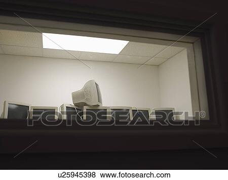 Stock Photo - Office Liquidation. Monitors in a Row. Fotosearch