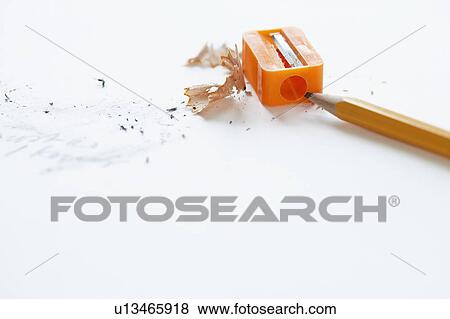 Orange pencil with orange pencil sharpener and shavings View Large Photo Image Stock Photo - Orange pencil with orange pencil sharpener and shavings. Fotosearch