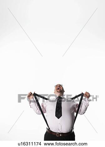 Overweight businessman stretching braces View Large Photo Image Picture - Overweight businessman stretching braces. Fotosearch