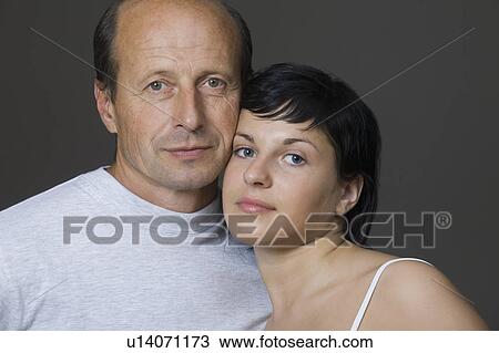 Stock Image - Portrait of father and daughter. Fotosearch