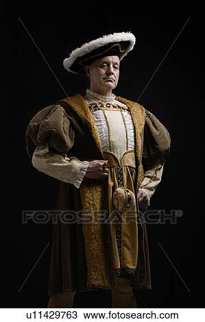 Stock Image - Portrait of King Henry VIII in historical costume. Fotosearch