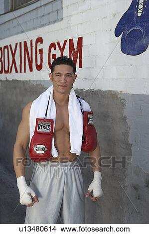 Portrait of male boxer outside gym View Large Photo Image Picture - Portrait of male boxer outside gym. Fotosearch