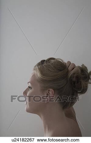 Stock Photo - Portrait of mid adult woman. Fotosearch