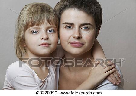 Stock Image - Portrait of Mother and Daughter. Fotosearch