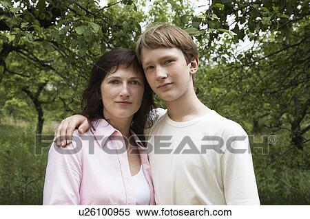 Portrait of mother and son in orchard View Large Photo Image Stock Photography - Portrait of mother and son in orchard. Fotosearch