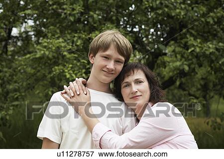 Stock Photo - Portrait of mother and son. Fotosearch