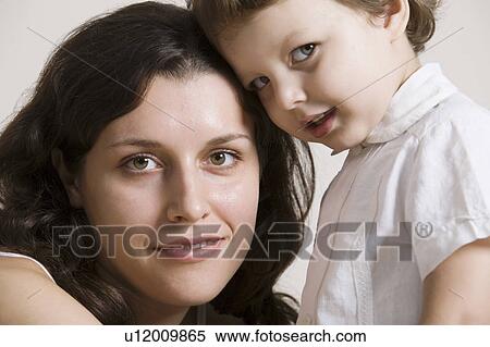 Stock Photography - Portrait of mother with her son, close-up. Fotosearch