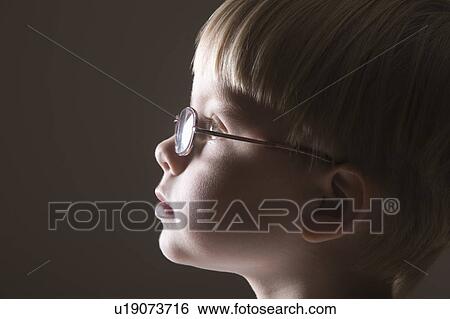 Stock Photograph - Profile of blonde-haired boy. Fotosearch