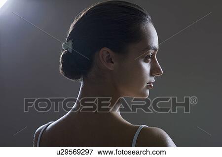 Profile Of Young Woman, Studio Shot View Large Photo Image Stock Photo - Profile Of Young Woman, Studio Shot. Fotosearch