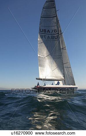 Stock Image - Sailboat on ocean. Fotosearch