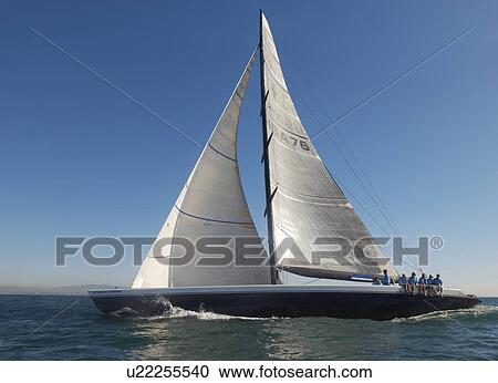 Stock Image - Sailboat on ocean. Fotosearch