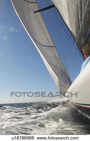 Stock Photo - Sailboat on ocean. Fotosearch