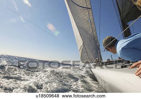 Sailor on yacht in ocean View Large Photo Image Stock Photo - Sailor on yacht in ocean. Fotosearch