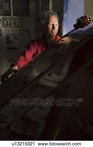 Senior Man in Garage with Vintage Car View Large Photo Image Stock Image - Senior Man in Garage with Vintage Car. Fotosearch