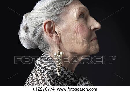 Senior Woman with Pearl Earrings View Large Photo Image Picture - Senior Woman with Pearl Earrings. Fotosearch