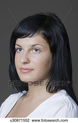 Serene young woman View Large Photo Image Stock Image - Serene young woman. Fotosearch