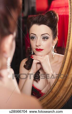 Showgirl looking in mirror View Large Photo Image Picture - Showgirl looking in mirror. Fotosearch