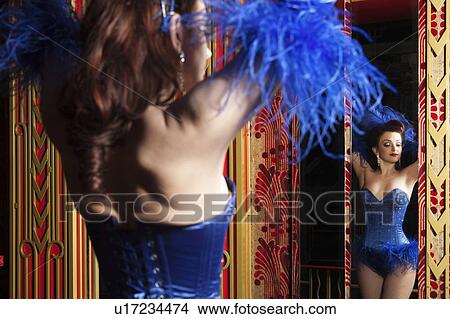 Showgirl posing in mirror View Large Photo Image Picture - Showgirl posing in mirror. Fotosearch