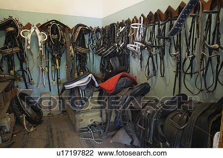 Stock Image - Storage Room with Riding Tack. Fotosearch
