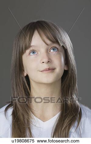 Studio portrait of girl smiling View Large Photo Image Stock Photography - Studio portrait of girl smiling. Fotosearch