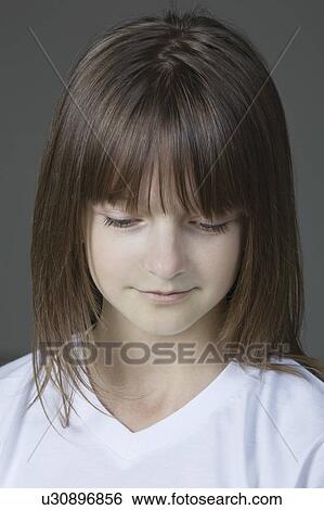 Studio portrait of girl View Large Photo Image Stock Photograph - Studio portrait of girl. Fotosearch