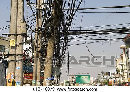 Stock Photo - Tangled Electrical Wires in City. Fotosearch