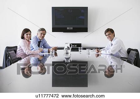 Three business colleagues in conference room, portrait View Large Photo Image Stock Image - Three business colleagues in conference room, portrait. Fotosearch