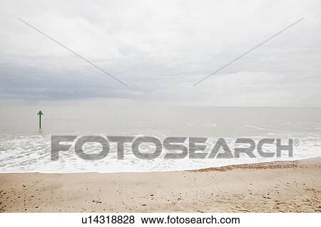 Stock Photo - Tide marker at sea. Fotosearch