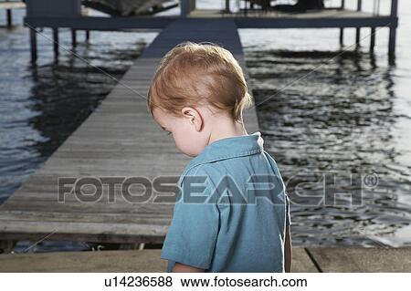 Toddler Boy on Pier View Large Photo Image Stock Photo - Toddler Boy on Pier. Fotosearch