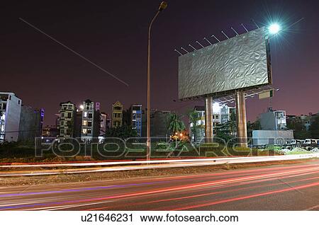 Traffic Light Trails Below Billboard on Road View Large Photo Image Stock Image - Traffic Light Trails Below Billboard on Road. Fotosearch