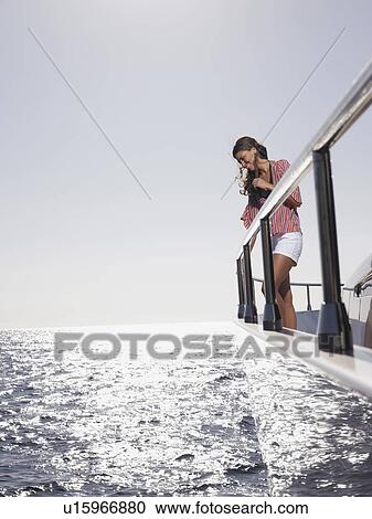 Woman on Deck of Boat View Large Photo Image Stock Image - Woman on Deck of Boat. Fotosearch