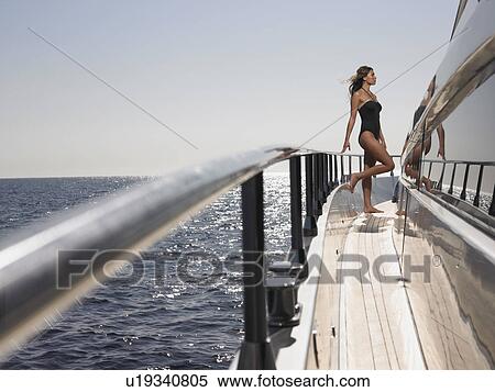Stock Photography - Woman on Deck of Boat. Fotosearch