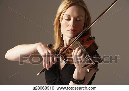Woman Playing Violin, close-up View Large Photo Image Stock Photograph - Woman Playing Violin, close-up. Fotosearch
