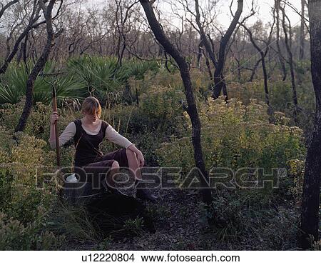 Woman with a Rake View Large Photo Image Picture - Woman with a Rake. Fotosearch